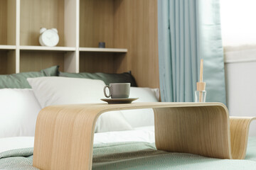 A cup of tea on a bed