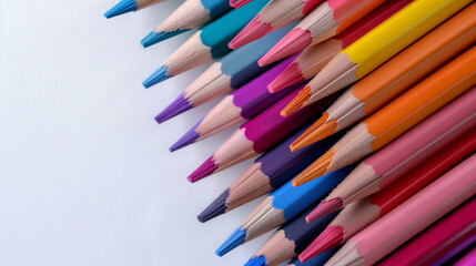 Fototapeta premium Close-up of Colorful Pencils on White Paper