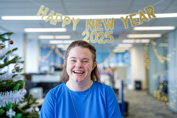Happy businesswoman with down syndrome celebrating new year in the office 2025