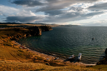 beautiful rocky shore of Lake Baikal at sunset