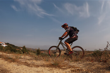 Cyclist Riding the Mountain Bike