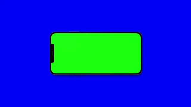 Green screen on blue smartphone on croma background
