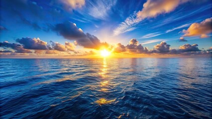 Endless horizon of the vast blue ocean during sunrise