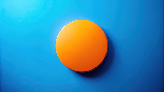 Close-up of vibrant orange circle on blue background