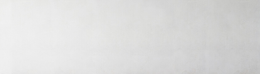Smooth light gray wall texture with subtle gradient, ideal for background or design elements.