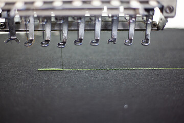 Machine embroidery when sewing stitches. Close Up, Blur, Textile Sewing Concept