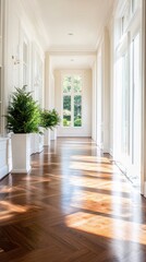 Obraz premium Bright hallway featuring elegant decor and greenery, showcasing natural light and polished wooden flooring.