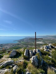 cross on the hill with a view of splitt kroatia