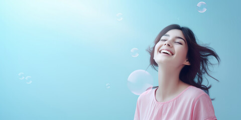 Fototapeta premium The image features a happy girl with a bright smile, surrounded by drifting soap bubbles against a light blue background, creating a joyful and whimsical atmosphere.