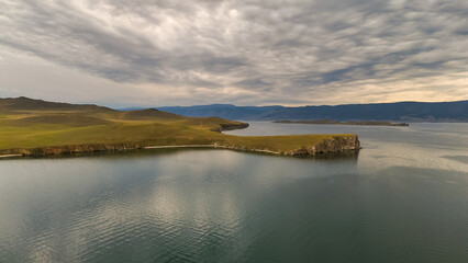 drone flight over the shore of Lake Baikal at sunset