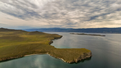 drone flight over the shore of Lake Baikal at sunset