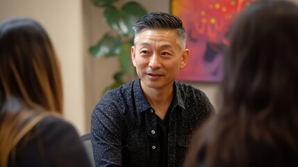 An Asian therapist guiding a multicultural group through anxiety treatment techniques, focusing on calm and balance in a diverse environment.