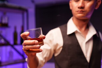 Barman pouring whiskey whiskey glass beautiful night