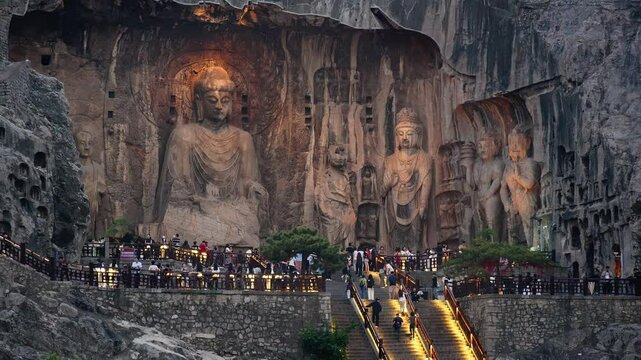 Luoyang, China: Night view of the famous Vairocana Buddha statue that lies in the Luoyang Longmen Grottoes complex in China. The statues dates from the 7th century.