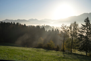 wafts of fog in the mountains of Austria