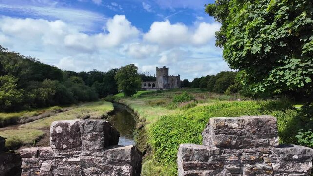 Ireland Epic Locations Wexford Tintern Abbey landscape view of this ancient monastic site on a bright summer day