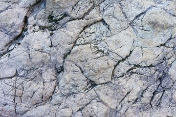 Cracked rock surface with lines