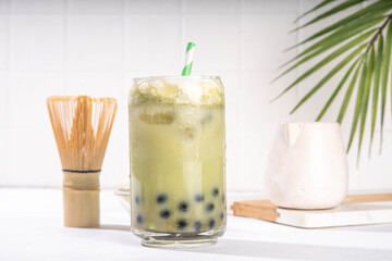 Green matcha boba bubble tea with tapioca pearl