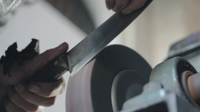 Knife sharpening on moving machine