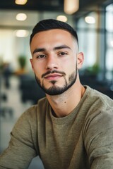 Naklejka premium Portrait of a Caucasian male 25 years old with a short beard and short black hair