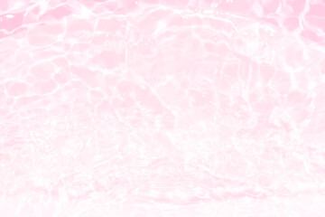 Fototapeta premium Pink water bubbles on the surface ripples. Defocus blurred transparent pink colored clear calm water surface texture with splash and bubbles. Water waves with shining pattern texture background