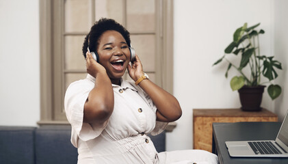 Black woman, headphones and employee portrait in office, streaming song and copywriter with laptop....