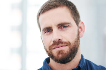 Fototapeta premium Closeup, office and portrait of business man with company pride, confidence and professional mindset. Creative startup, worker and face of person with for career opportunity, work or job in workplace