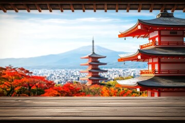 Obraz premium Stunning view of traditional Japanese pagoda framed by autumn foliage and distant mountains.
