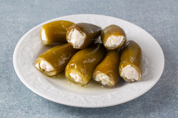  Cheese Stuffed Jalapeno Peppers on Wooden Background. Turkish name; Peynir Dolgulu Jalapeno