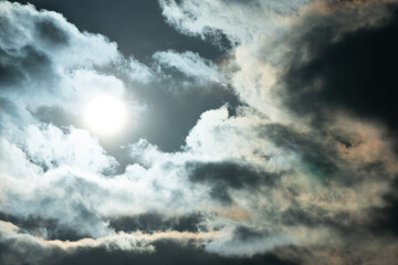 Stormy dramatic clouds and sun