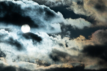 Stormy dramatic clouds and sun