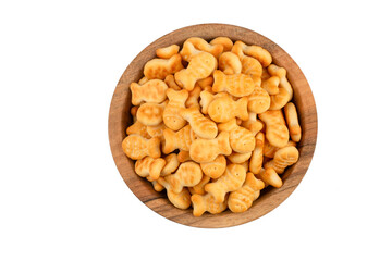 Yellow fish crackers on isolated white background.