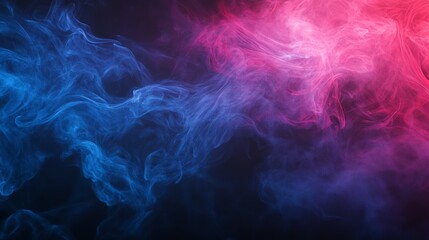 Obraz premium Colorful smoke swirls in blue and pink against a dark background.