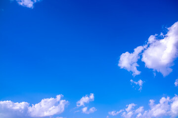 Clouds against the blue sky close-up. Changes in weather during the rainy season. Thunderclouds,...