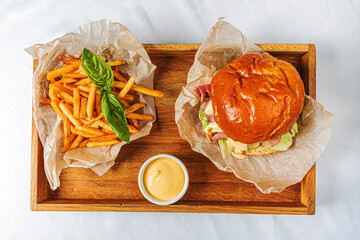 burger with french fries and sauce