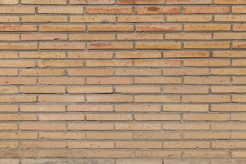 Sand colored mosque brick wall texture