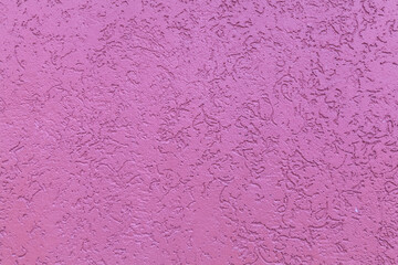Texture of painted plastered surface as background. Bark beetle