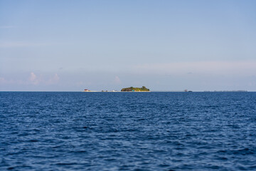 Timba Timba Island (Pulau Timba Timba) as seen from a far distance at Pandanan Island. Bohayen Island visible in far distance, to the right.