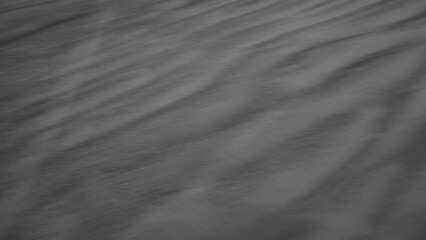 Abstract pattern background of sand at beach side 