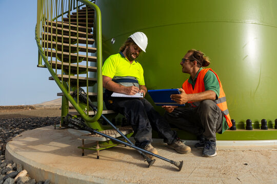 Disabled inspector working in renewable energy sector