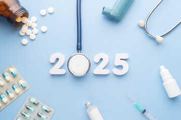 2025 Happy New Year banner for health care and medical concept. Stethoscope with doctor pills,...