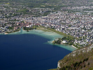 annecy lake and old town seen from mont veyrier and mont baron scenic hike on top of mountain in french alps. High angle view