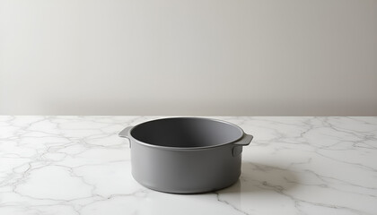 Simple gray cooking pot, minimalist mood, placed on a marble countertop, with a neutral background