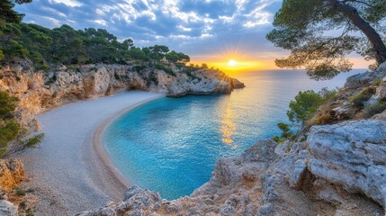 Obraz premium Sunrise over a secluded cove with a white sand beach and turquoise water.