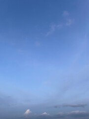 sky is blue and clear with no clouds. The sun is shining brightly, making the sky look even...