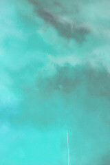 Abstract Brush Stroke Painting with Shades of Blue, Purple, and Green.