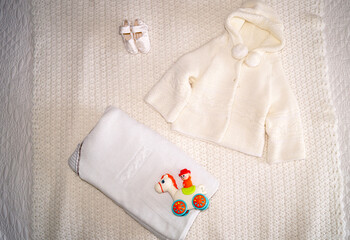 fabric knitted blanket and warm jacket. High quality photo