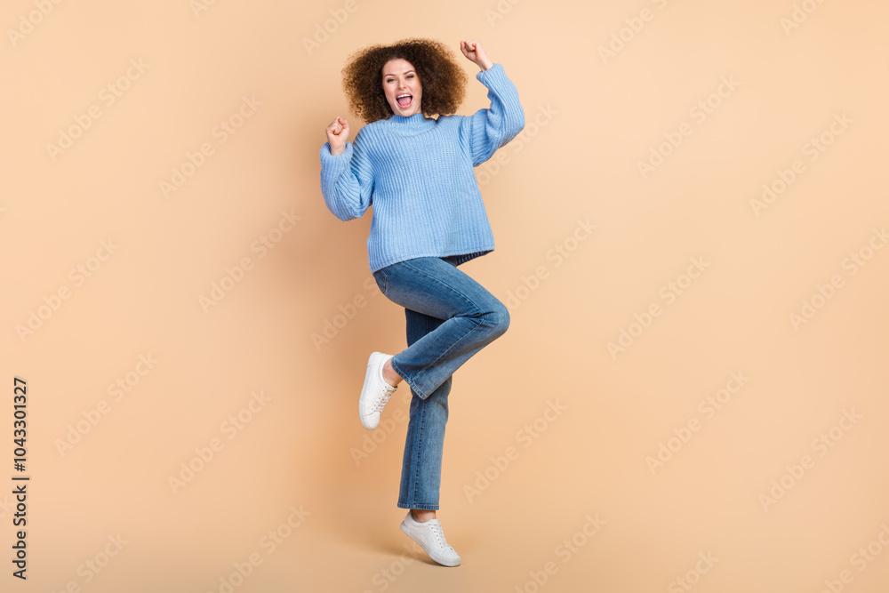 Canvas Prints Photo portrait of young brown hair chevelure lady in blue sweater jump and shouting support her boyfriend isolated on beige color background