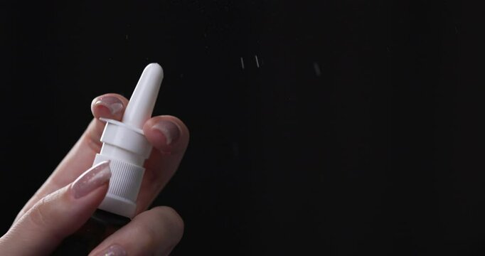 Person Holds in Hand Aerosol Bottle with Pharmaceutical Preparation, Spraying Medicine from Cold, Virus, Flu, Runny Nose. Medical and Healthcare Concept, Nasal Spray - Vasoconstrictor Addictive.