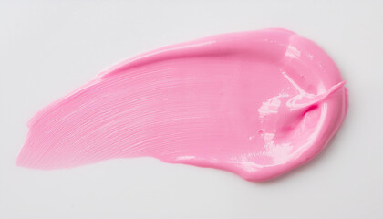 Pink oil paint smudge on white background.